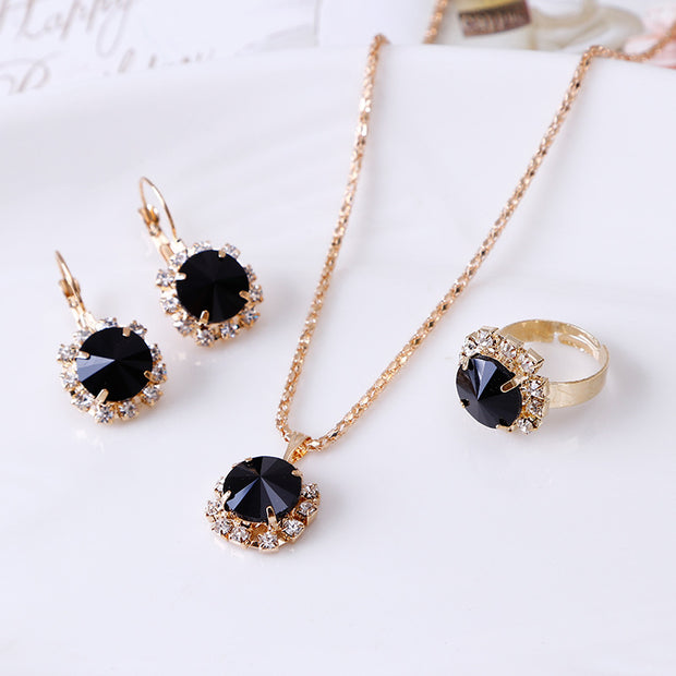 Title: Stylish Crystal Jewelry Set - Sparkling Alloy Necklace, Earrings, and Ring Set for a 43cm Perimeter, with Adjustable Extender Chain.